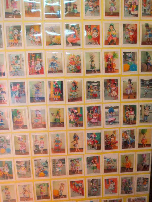 Colorful outfits made and worn by older grade school students.